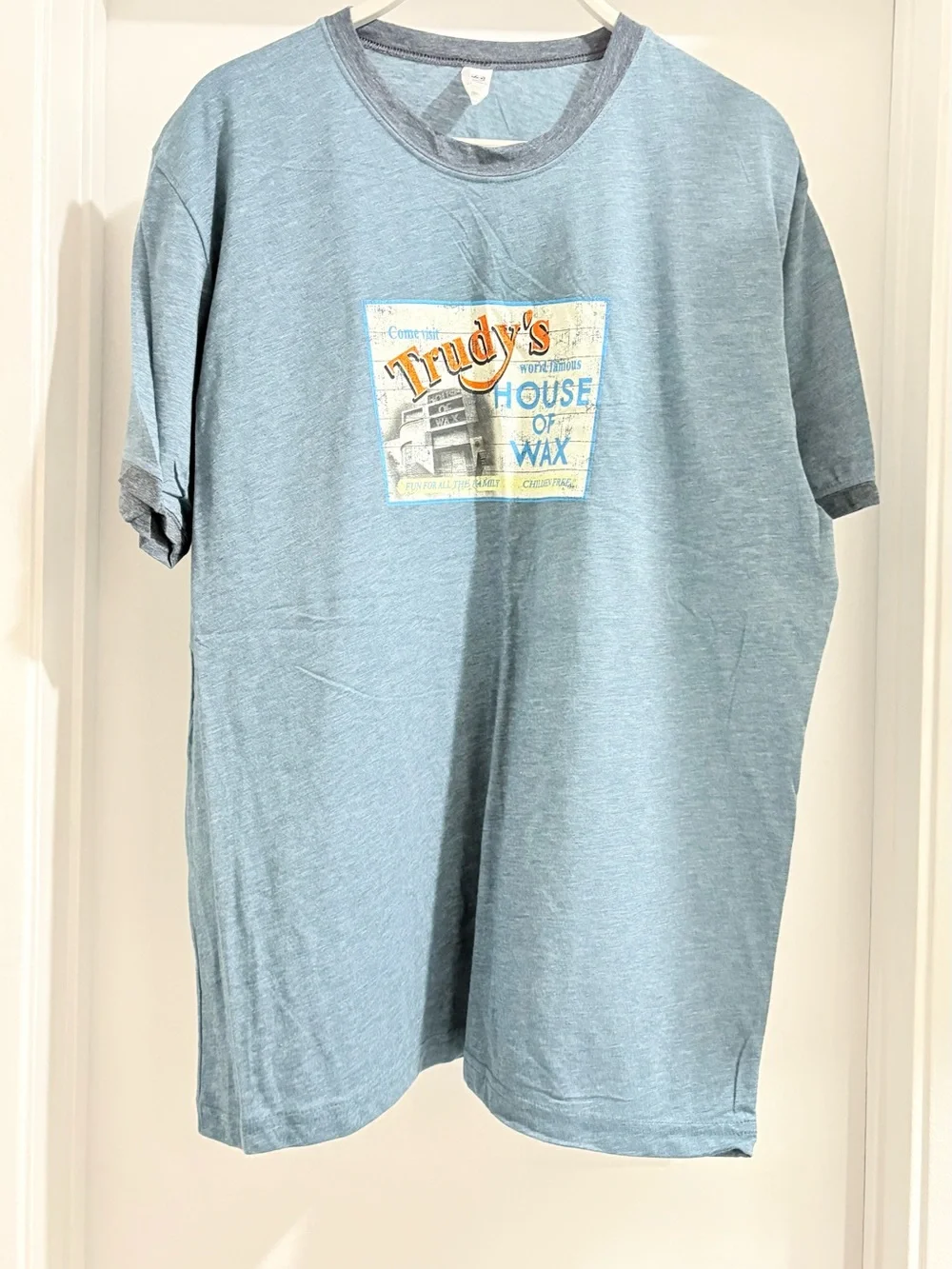 Next Level Apparel light blue heather vintage graphic ringer tee